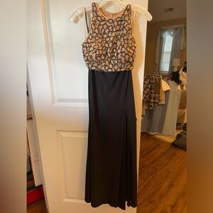 Black form dress. Size 4 but taken in to size 0.